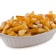 Poutine, traditional fast food in Quebec, Canada. Closeup